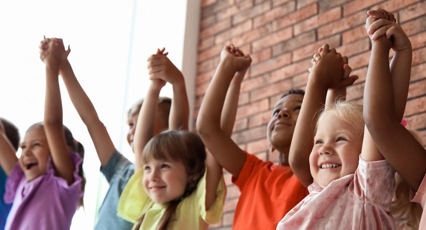 group of children holding hands