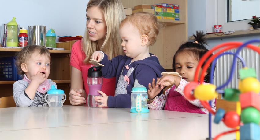 child care provider with three children