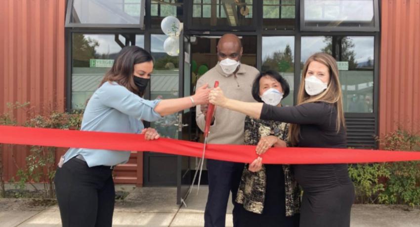 Echo Glen staff cutting the ribbon on the campus cosmetology school