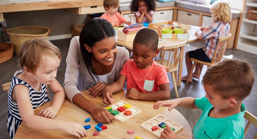 kids and teacher in child care